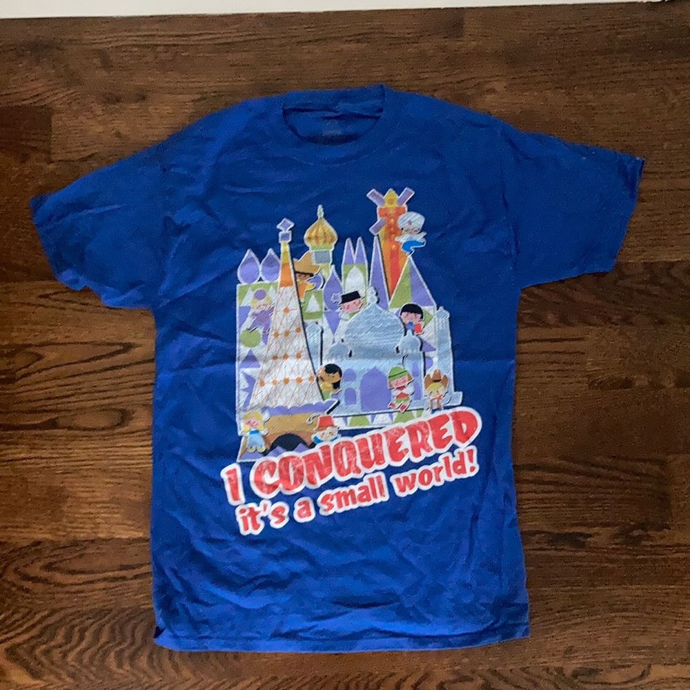 I Conquered its a small world! T-Shirt